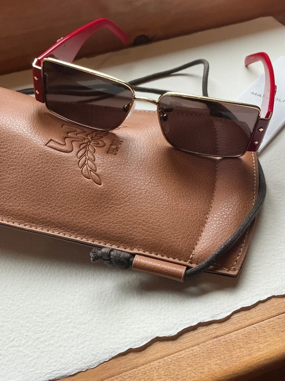 MCM Red and Gold Shield Sunglasses with crossbody case